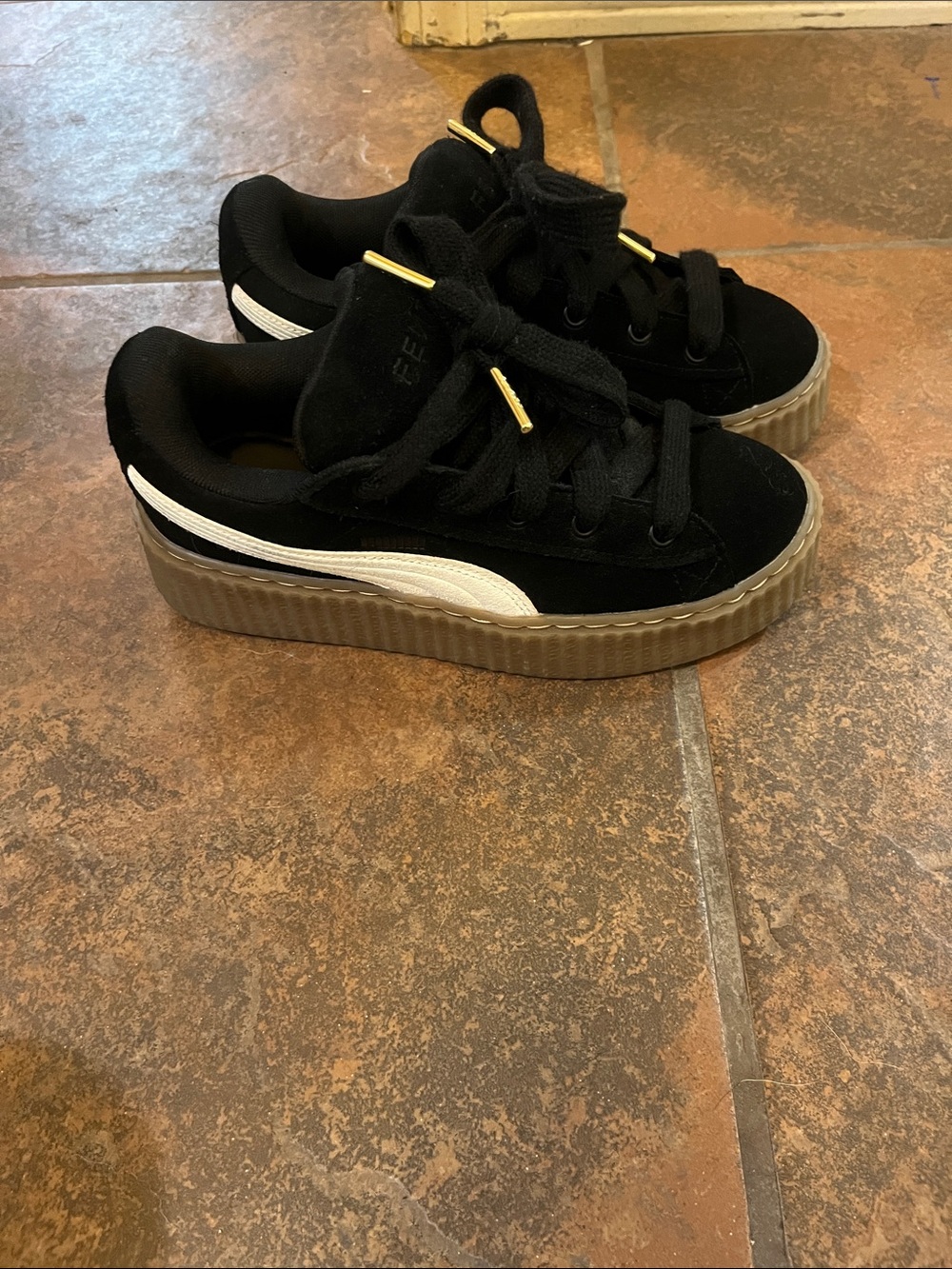 Puma Kids Black Suede Sneakers with White Formstripe and Gum Platform